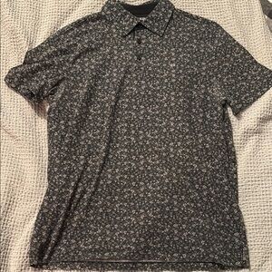Calvin Klein Black Polo Shirt with Patterned Design